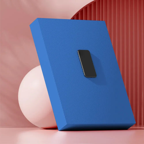 Yoga balance pad thickened foam cushion from our smart yoga mats collection, side angle view showing blue textured surface.