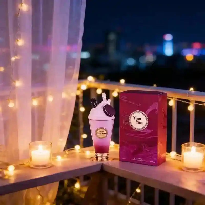 Yum Yum 100ml EDP for women. Floral fruity perfume in a unique dessert-shaped bottle with macaron and cream topper.