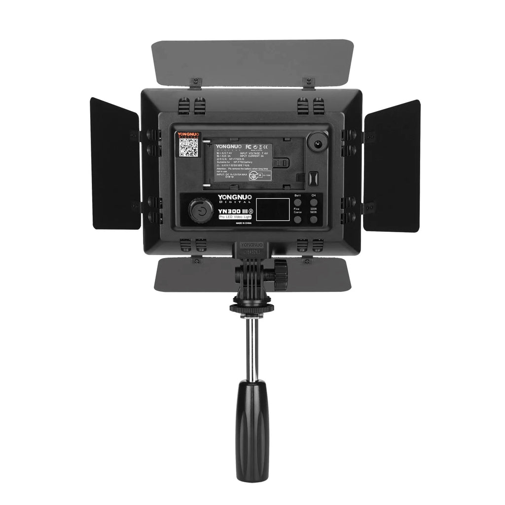 YN300 III LED video light with adjustable barn doors and handheld grip for photography and videography.