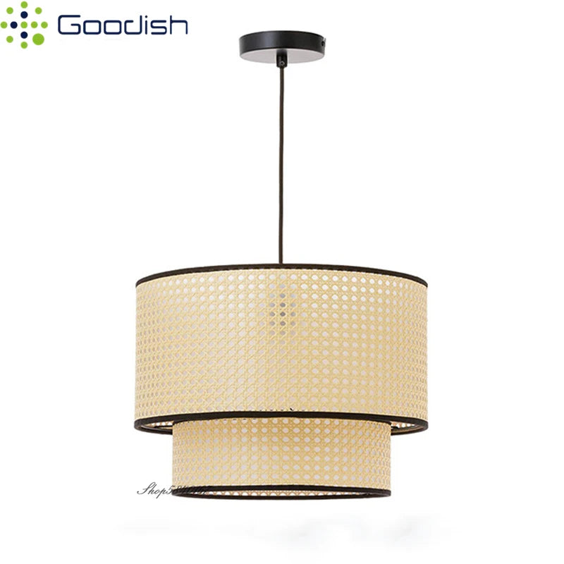 Two-tier cylindrical pendant light with beige woven rattan shade and black trim, suspended by a cord for interior