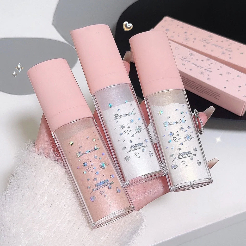 Tidesmit glitter powder highlighter for face and body in a shimmering natural blush texture close-up
