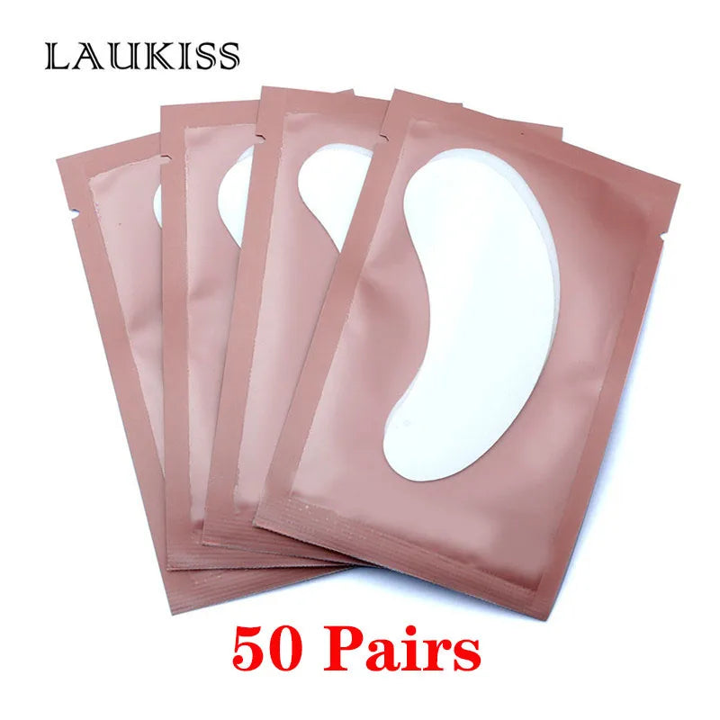 Lint-free pink eye patches for eyelash extension, 50 pairs of smooth, gel-textured under-eye pads in individual packs.