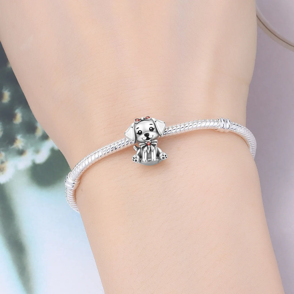 Cute 925 sterling silver dog charm with red bow on bracelet for pet lovers—perfect trendy DIY jewelry gift.