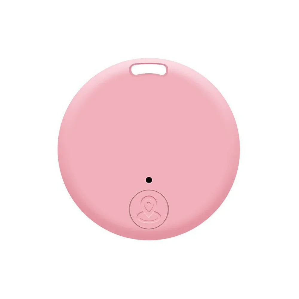 Mini pink Bluetooth GPS pet tracker to prevent loss. Compact smart locator tag for dog collars or cat harnesses.
