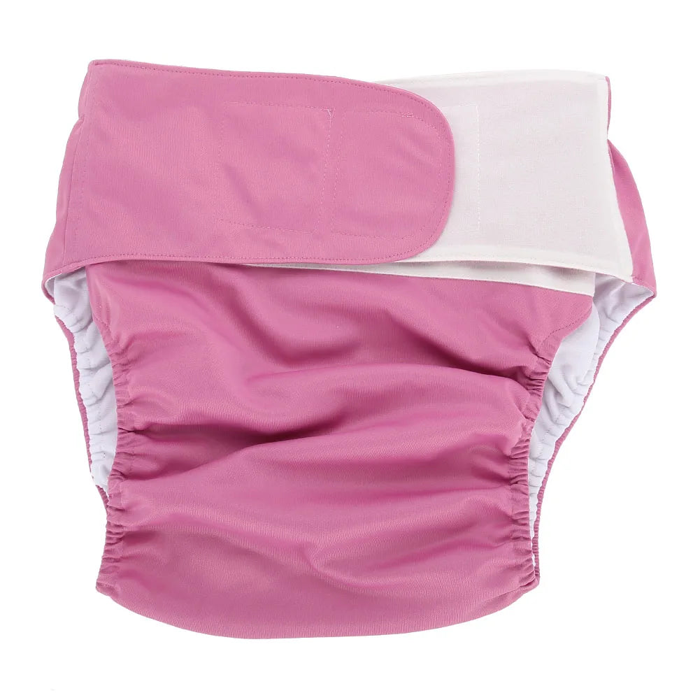 Pink reusable baby care cloth diaper with adjustable hook and loop waist closure.