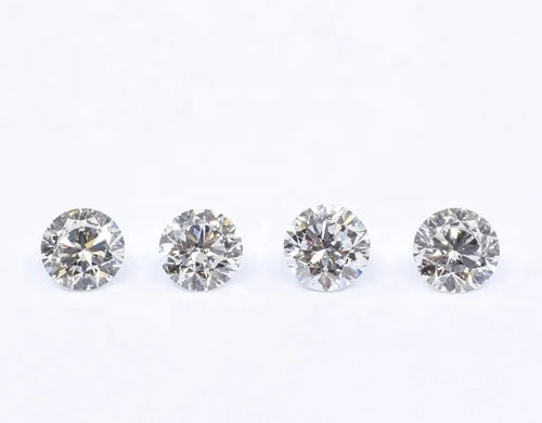 Round brilliant lab-grown diamond set, four white stones viewed from above