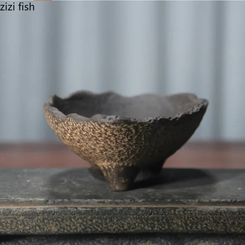 Textured ceramic flowerpot planter, bowl form with dark interior and speckled beige exterior