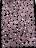 Rose quartz cabochon loose stones, pastel pink rounded ovals and teardrops with shine