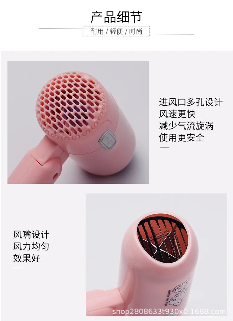 Pink foldable mini hair dryer with perforated air intake, focused airflow nozzle, and low-power travel design.
