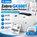 Desktop label printer with label roll, front panel, and barcode label example