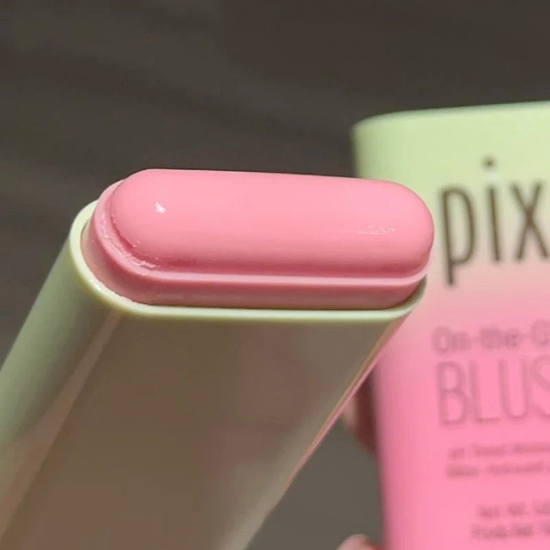 Tidesmit Pixi On-the-Glow cream blush stick in juicy ruby shade swatch for hydrating buildable face makeup application