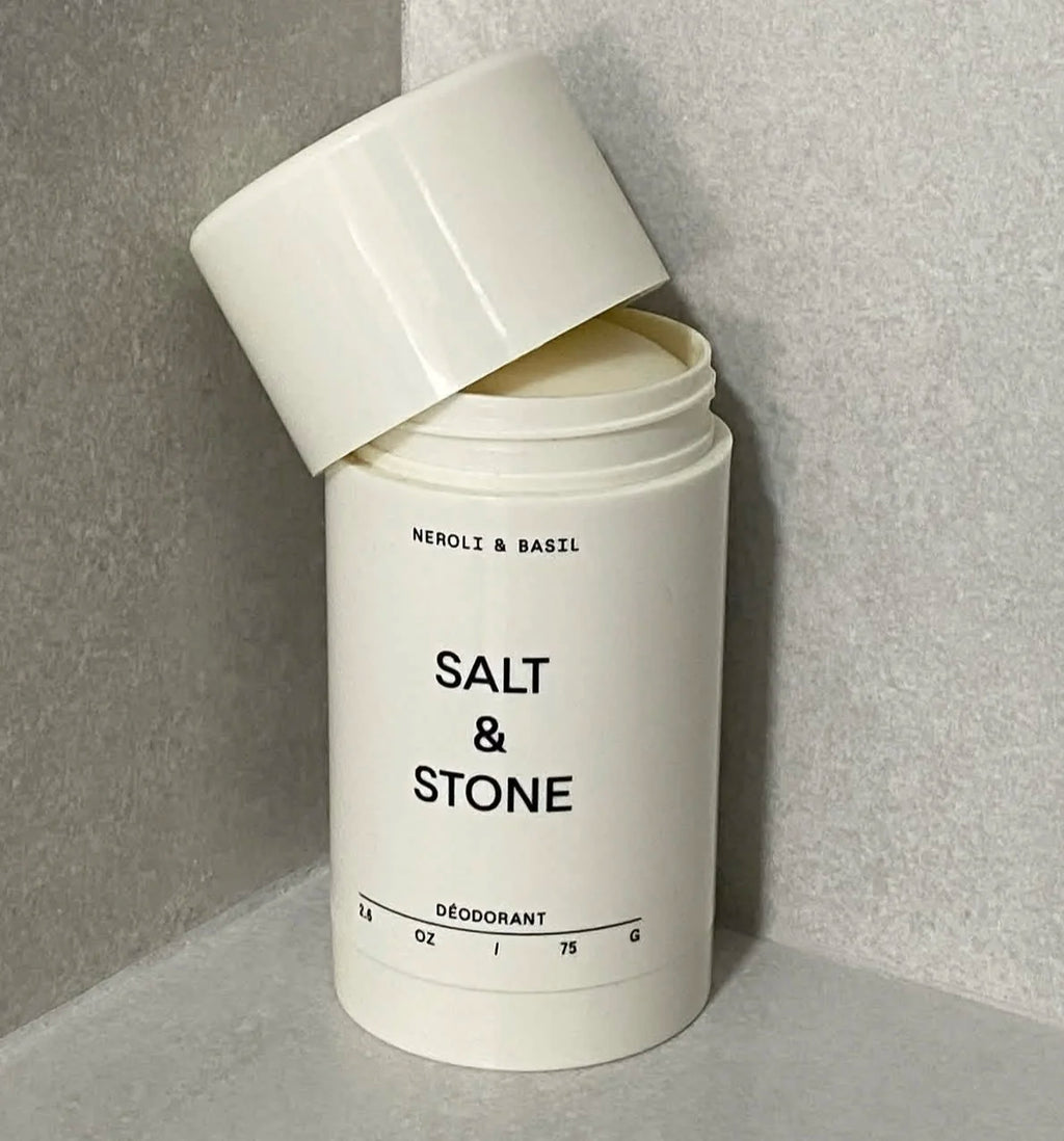 Tidesmit SALT & STONE natural plant-based deodorant stick in Black Rose, Oud, Neroli, and Basil for odor control.