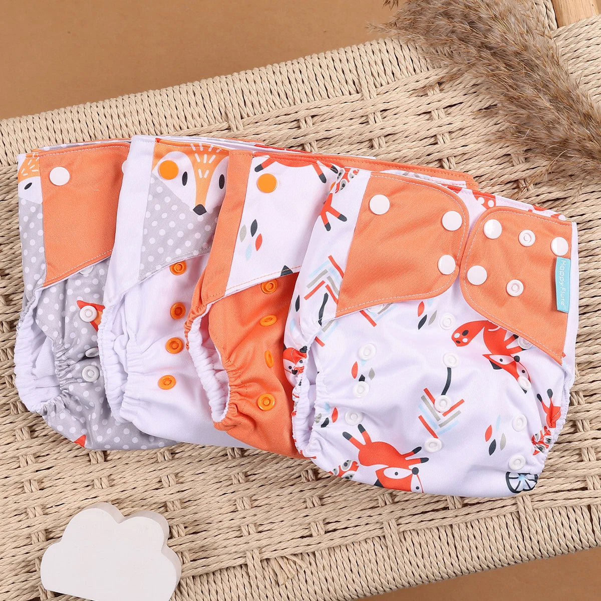 Happy Flute fox print adjustable cloth baby diapers with snap buttons. Reusable baby care product, set of four.