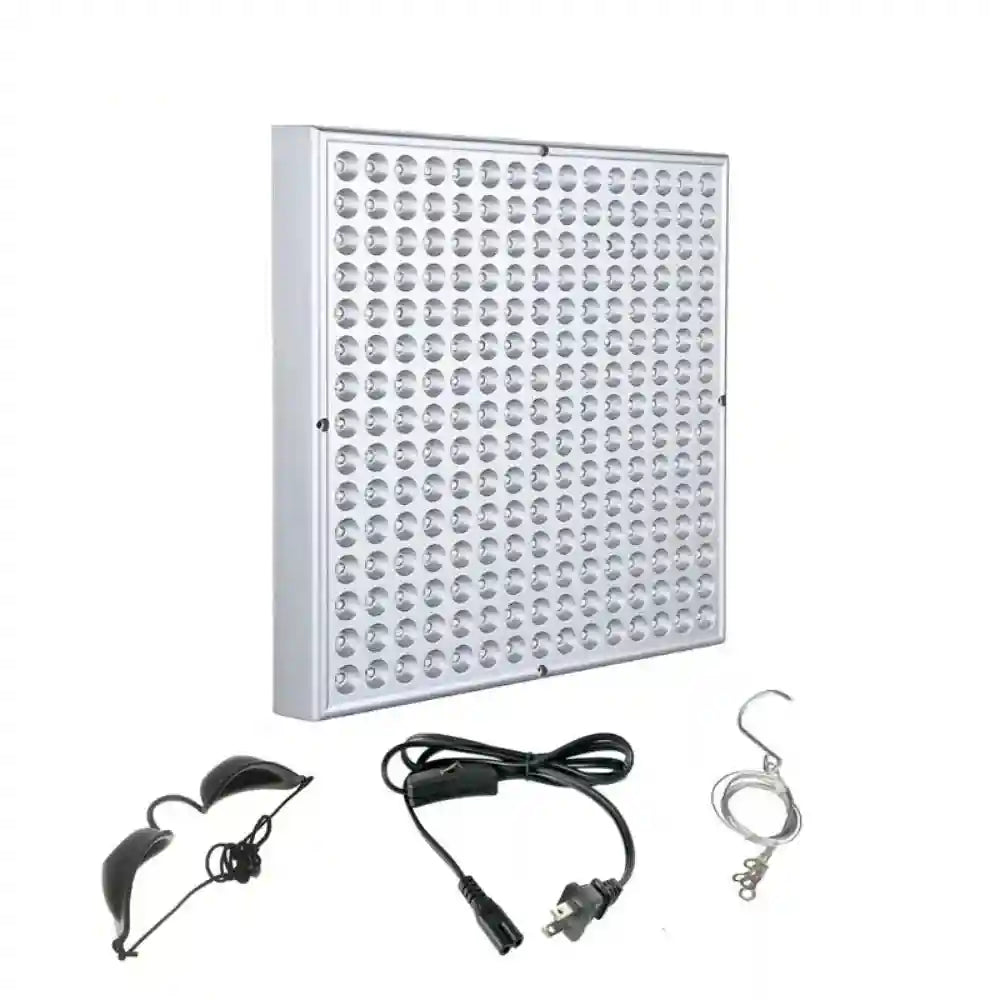 Square silver red light therapy panel with grid of LEDs, power cord, protective goggles, and hanging wire kit.