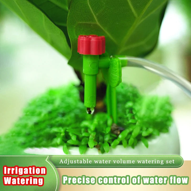 Adjustable micro dripper stake with red top releasing a drip into planter soil