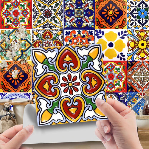 Colorful patterned 4x4in tile sticker being applied by hand