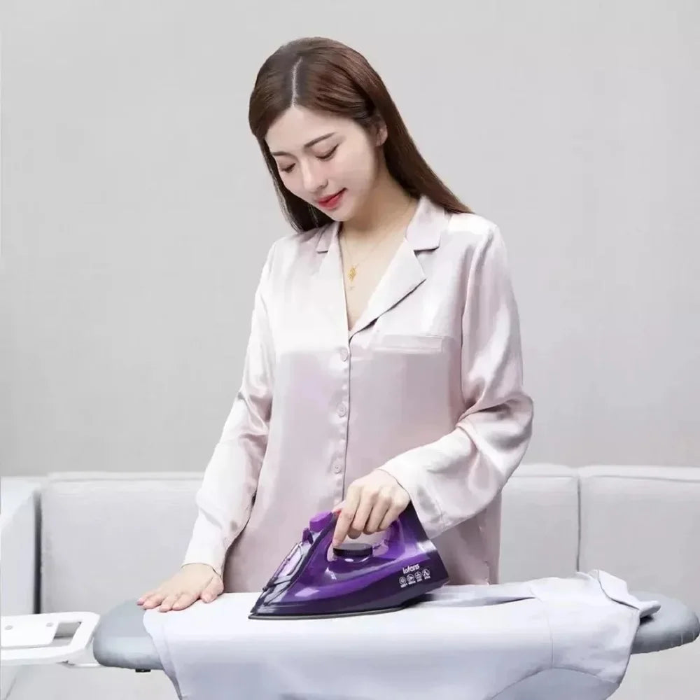 Tidesmit Lofans YD-012V cordless steam iron showing detailed water tank and ergonomic handle design