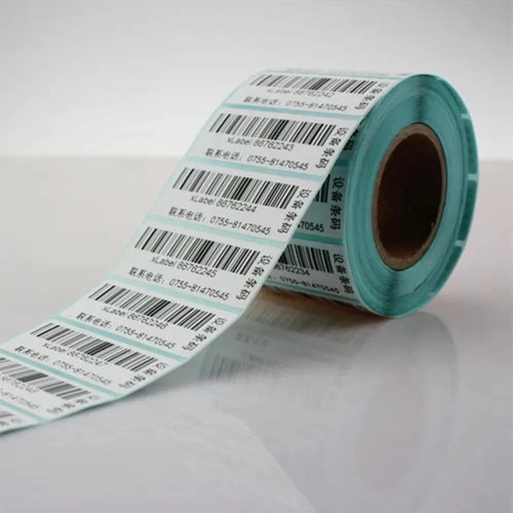 Close-up of thermal label sticker roll with printed barcode labels on white sheets