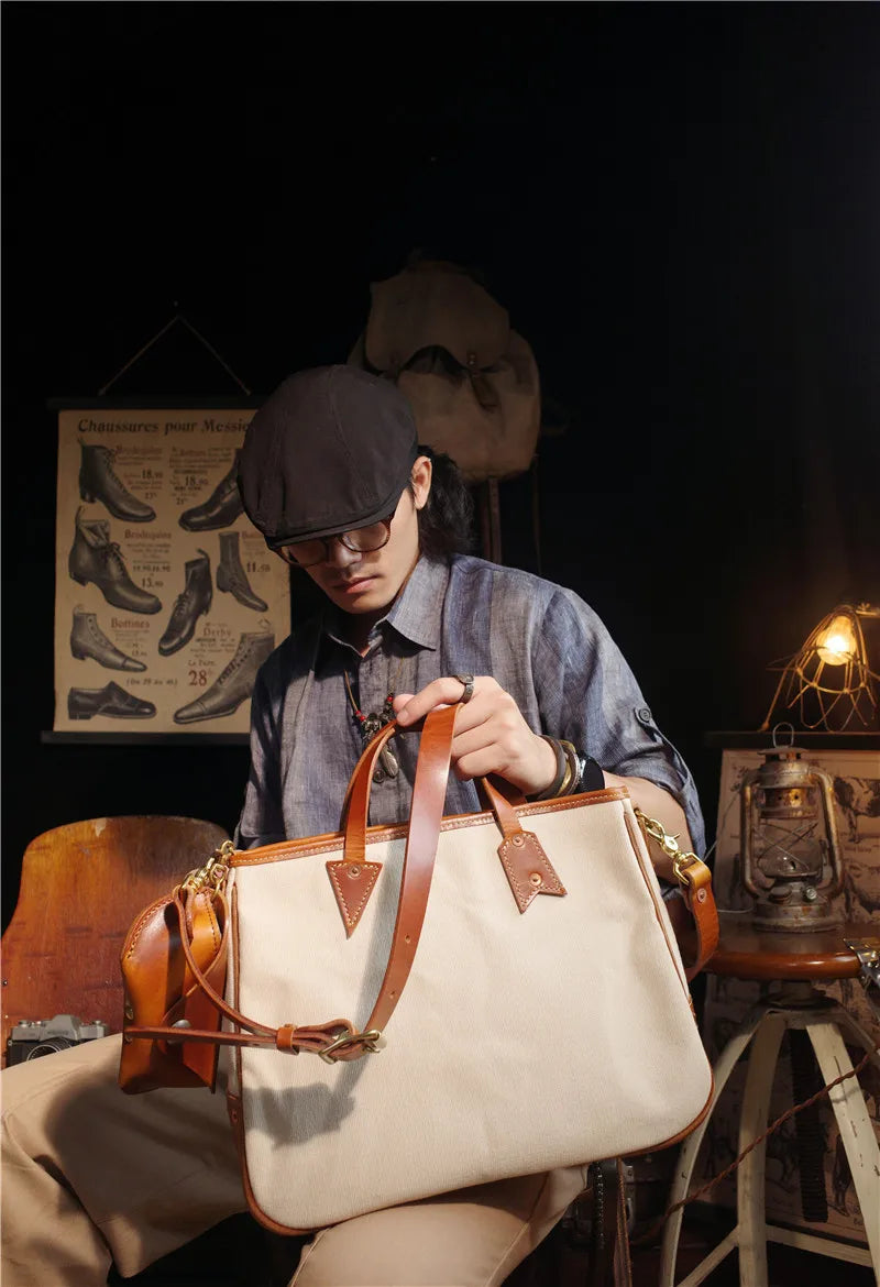 Simple designer handmade thick canvas cow leather men women's handbags outdoor daily work travel large-capacity messenger bag