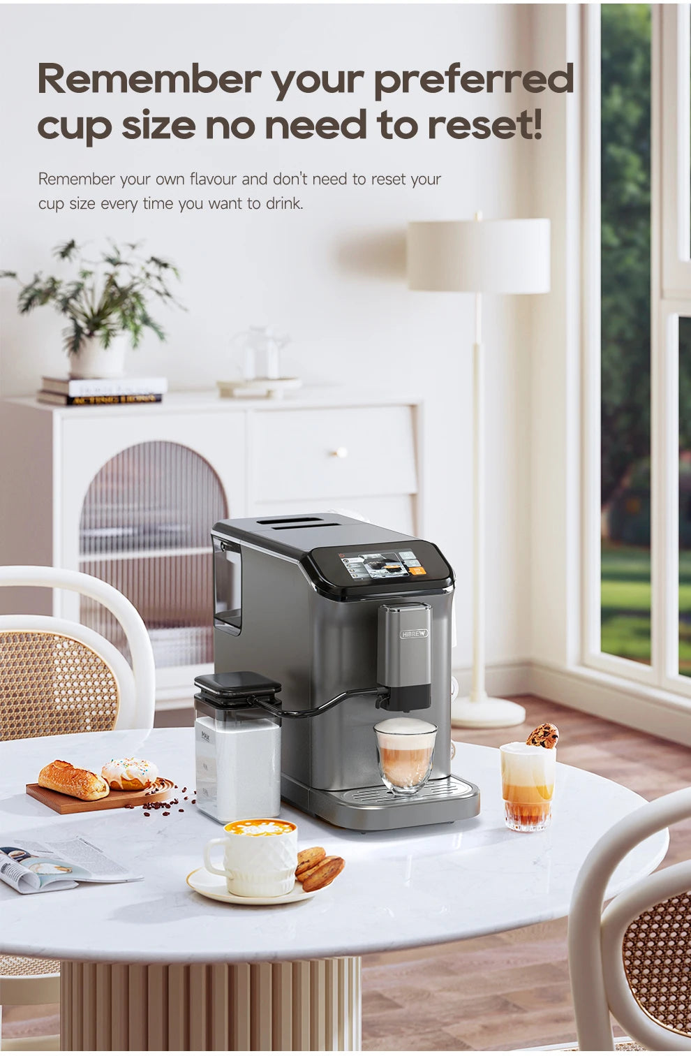 HiBREW grey automatic coffee maker with milk frother and digital touchscreen display on a kitchen table.
