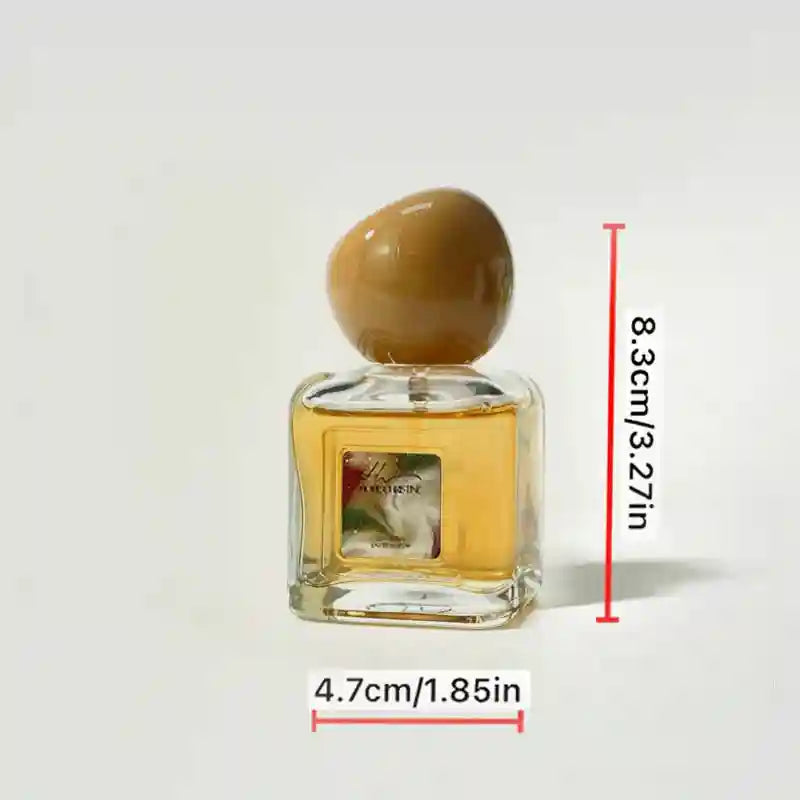 Lome Christine EDP: Coconut Vanilla Gourmand perfume for women and men in a square glass bottle with a round cap.