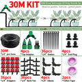 Drip irrigation kit set with coiled 30M hose, adapters, stakes, and barb tees