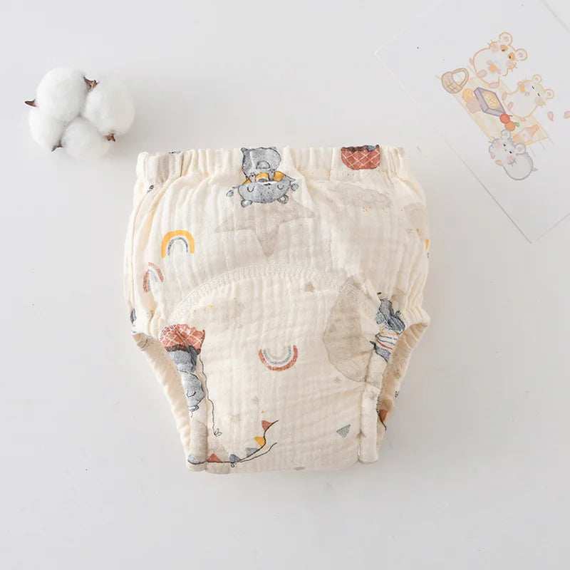 Reusable cotton baby diaper with cute bear and rainbow print for comfortable infant care.
