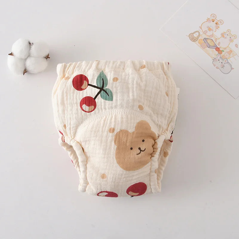 Baby care training diaper in cream muslin with cute bear and cherry print design.