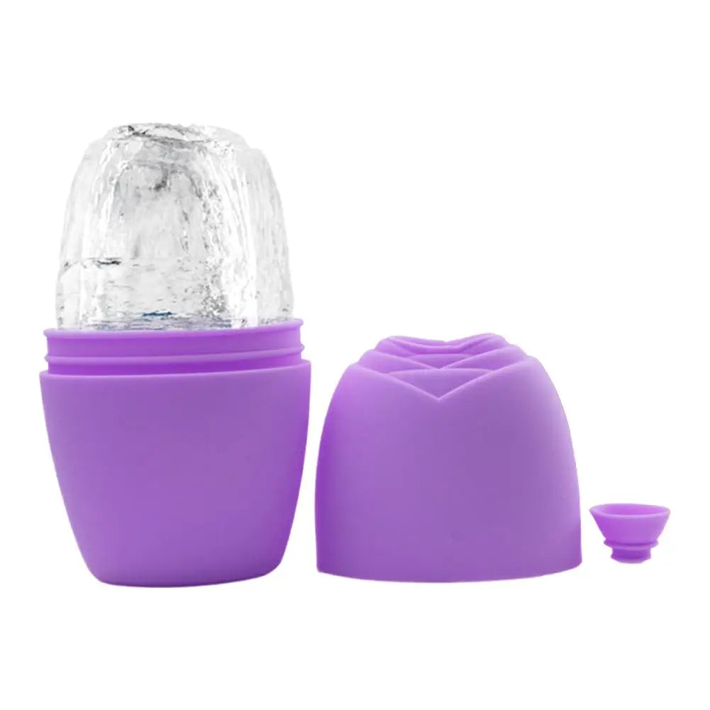 Purple silicone ice face roller mold with rose-shaped cap and frozen ice insert, isolated on a white background.