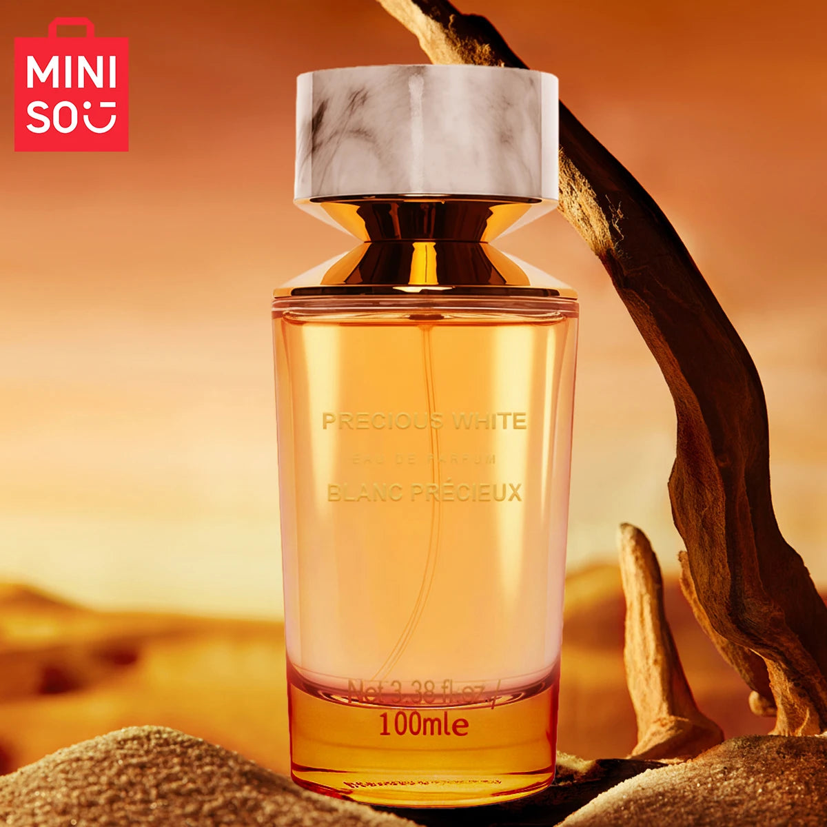 MINISO Precious White Eau de Parfum for men. 100ml luxury woody fragrance in a chic glass bottle with marble cap.