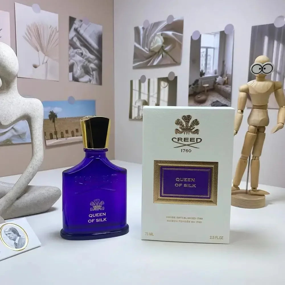 Creed Queen of Silk Eau de Parfum: deep blue bottle, gold cap, luxury unisex spray, 75ml original designer fragrance.