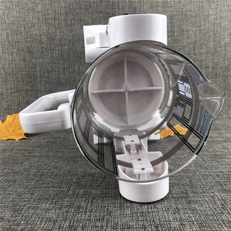 Star Wars R2-D2 white and glass coffee maker with top-down view of the carafe interior.