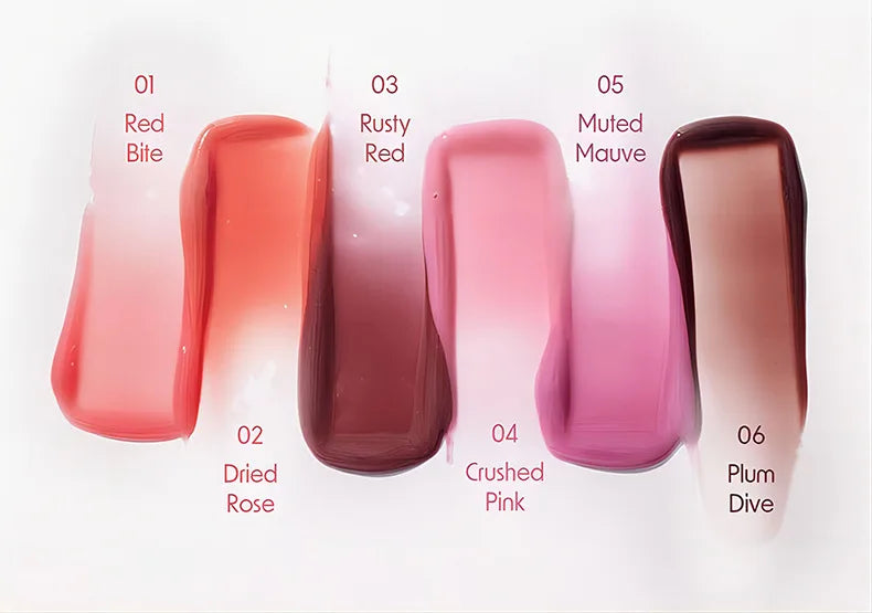Swatches of hydrating, non-sticky tinted lip gloss and oil in shades from Red Bite to Plum Dive on a white background.