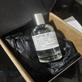 Le Labo Santal 33 EDP 3.4oz perfume spray. Unisex woody fragrance in minimalist glass bottle. Luxury holiday gift.
