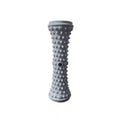 Grey spiked foot massage roller for plantar fasciitis, muscle relaxation, yoga recovery, and home fitness therapy.