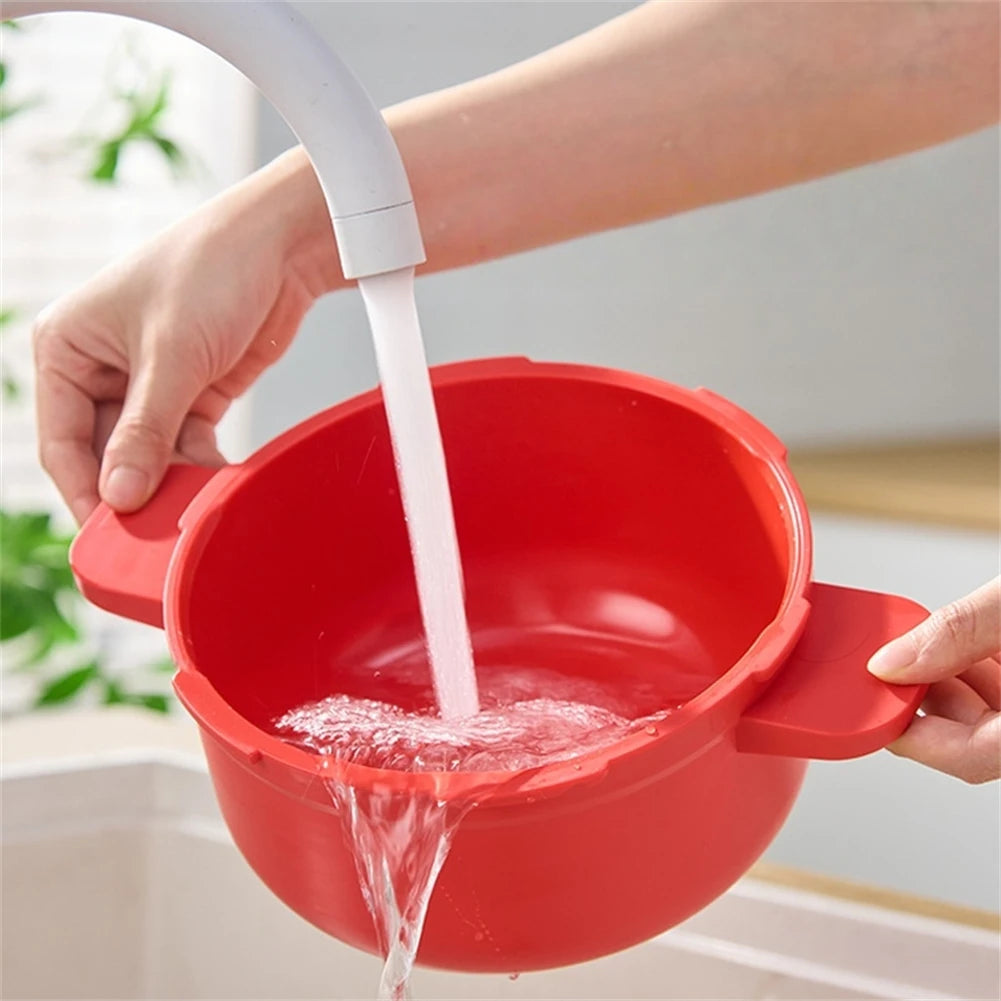 Hand pouring water into red microwave pressure cooker pot