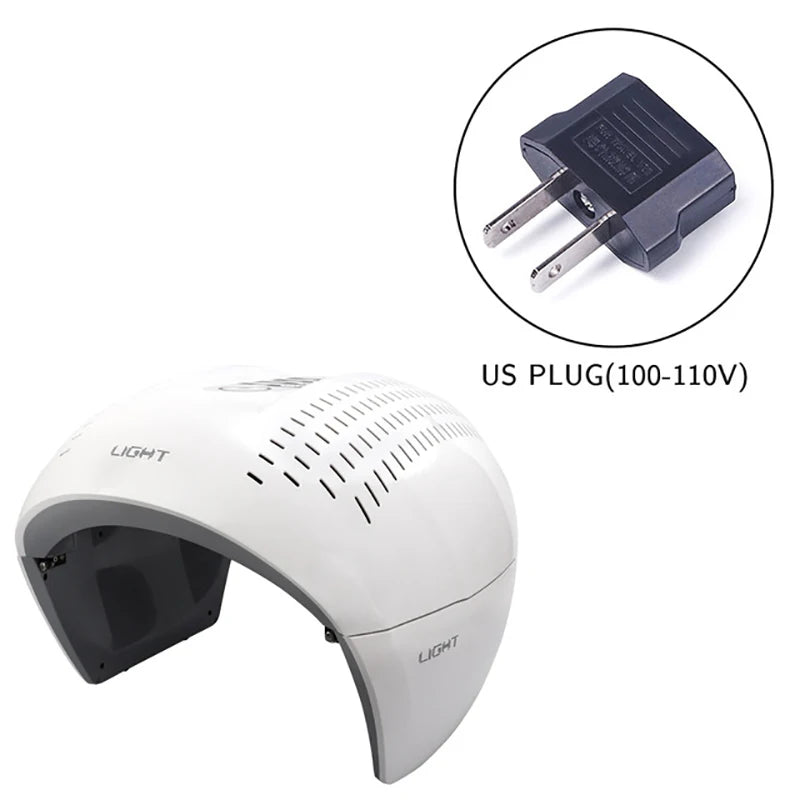 White LED face mask for skincare with a dome shape, cooling vents, and a two-prong US power plug.
