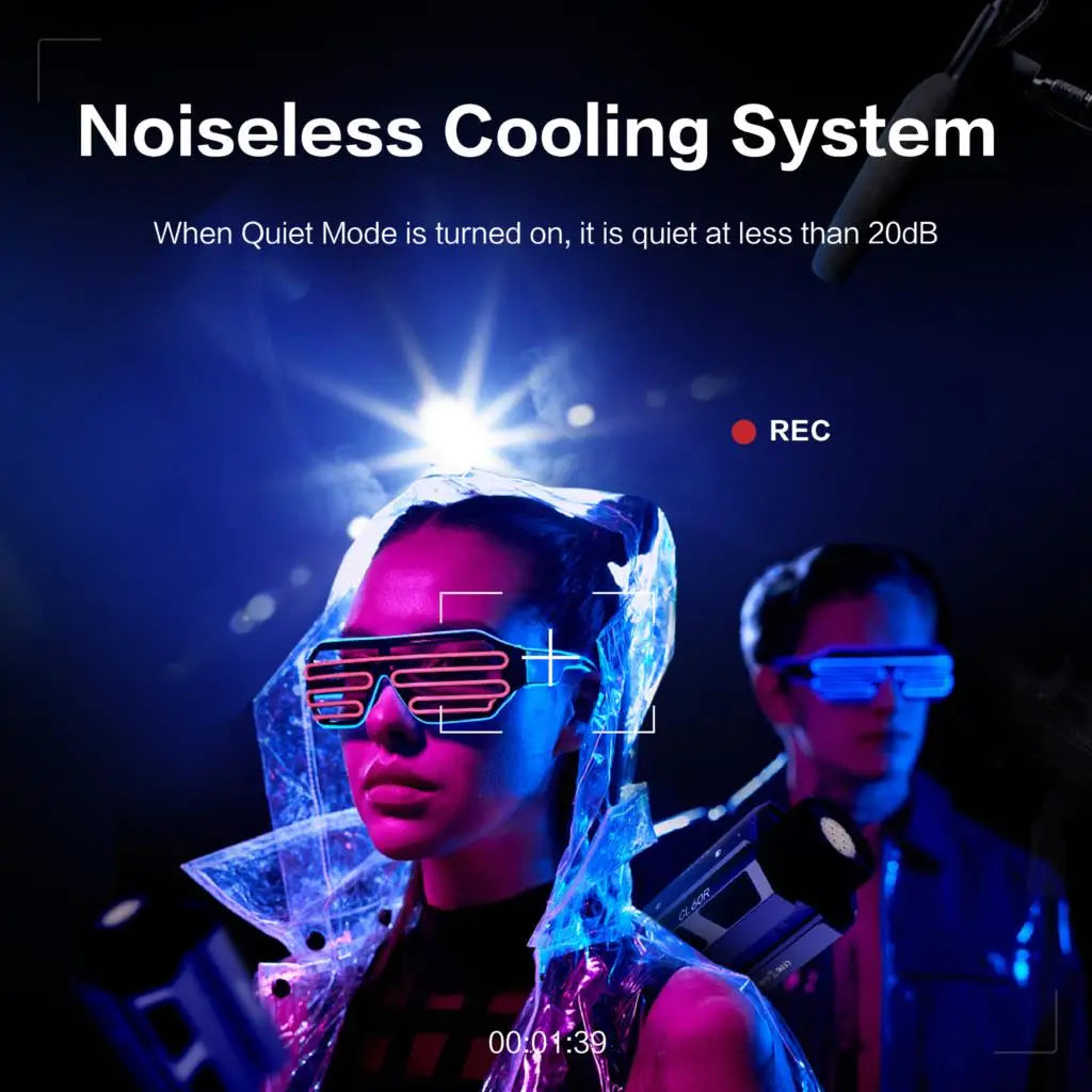 Two people in a studio setting with bright, glowing neon-style LED shutter glasses and a CL60R video light.