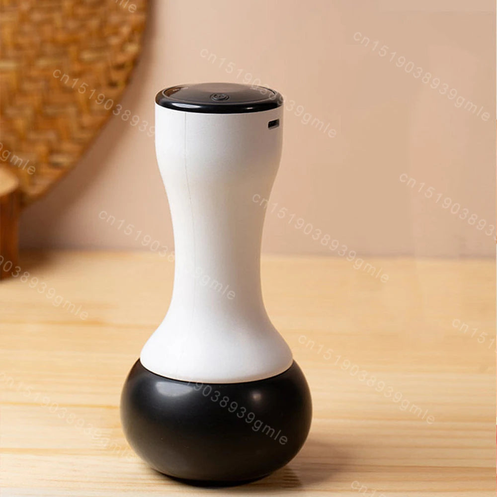 Electric Bian stone Gua Sha massager with a white hourglass-shaped handle and a smooth, rounded black base.