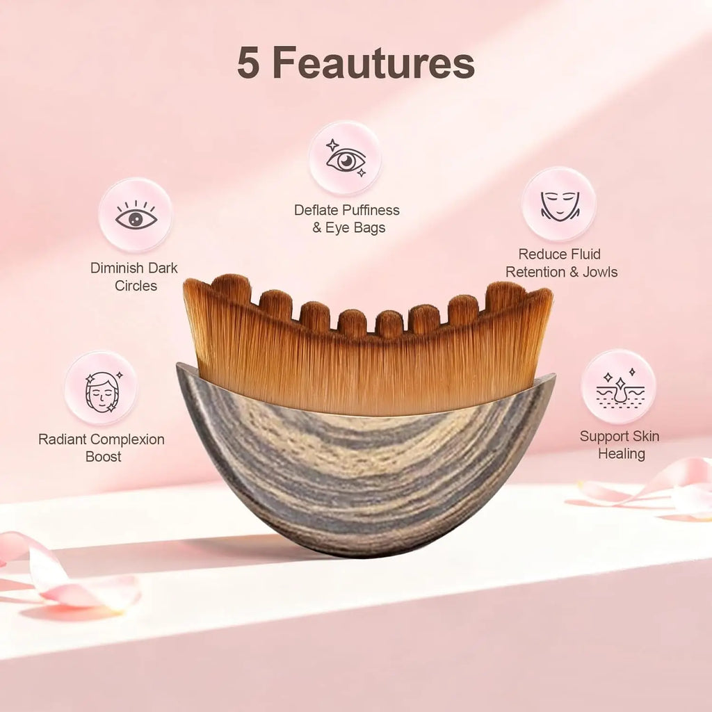 Crescent-shaped facial sculpting brush with a grey wood-grain handle and dense brown nylon bristles.