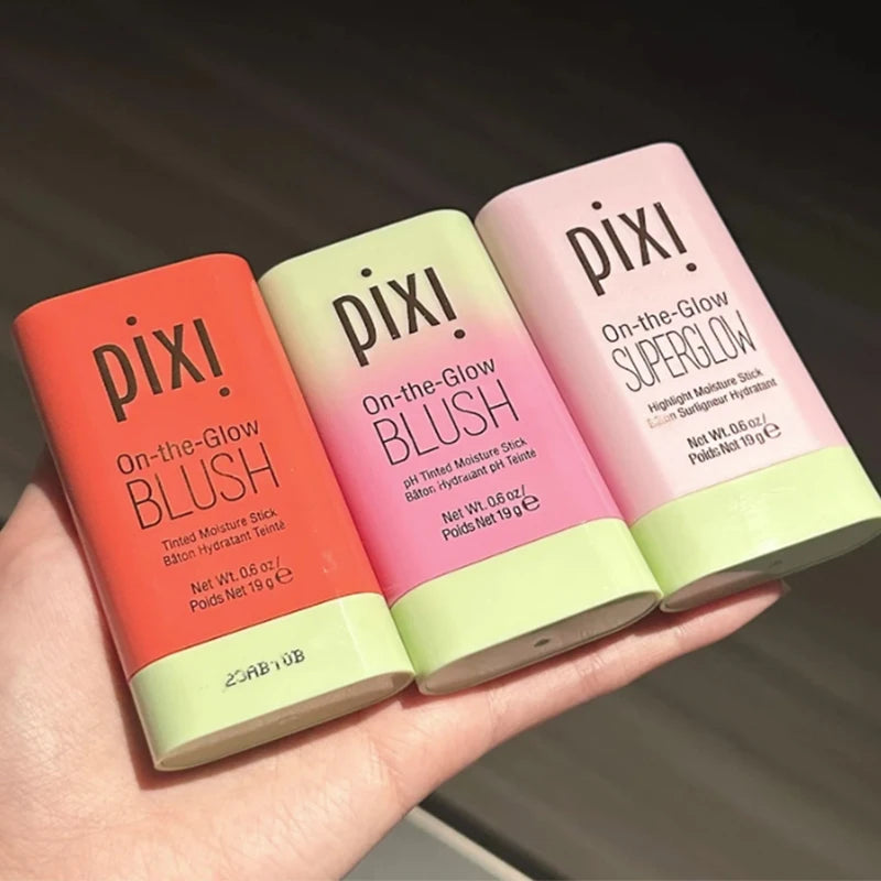 Tidesmit Pixi On-the-Glow cream blush stick texture swatch in ruby and juicy shades for hydrating cheek makeup