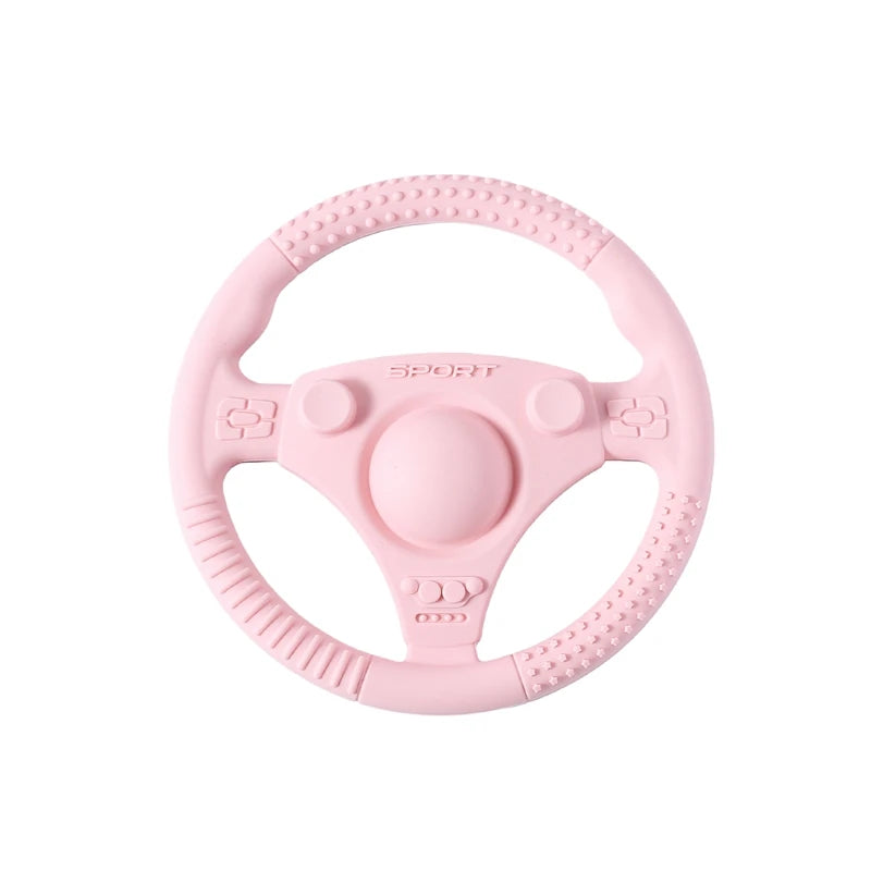 Pink silicone steering wheel teething toy for baby teething relief.