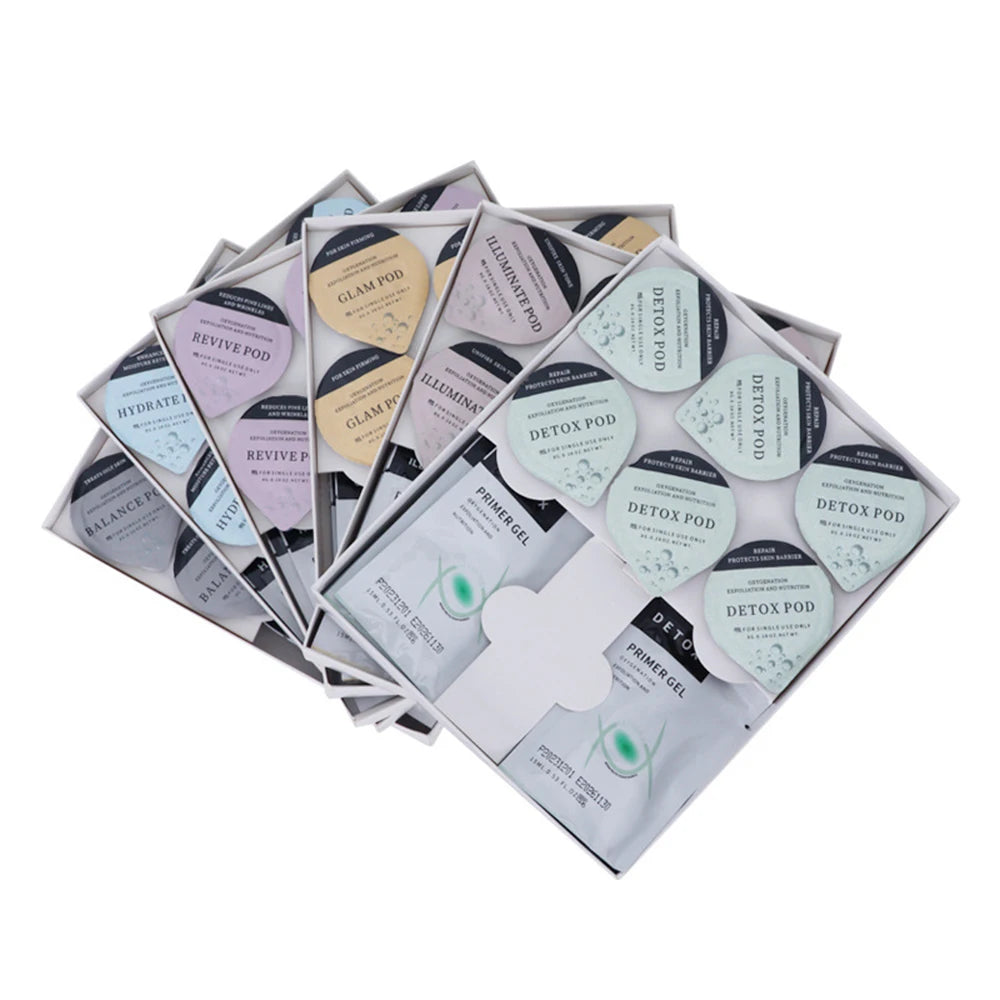 An assortment of colorful facial treatment pods and primer gel sachets organized in white display boxes.