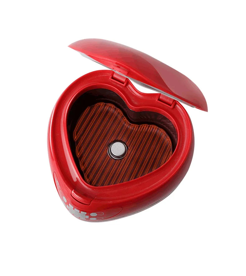 Red heart-shaped rice cooker inner pot with heating surface and latch-open lid.