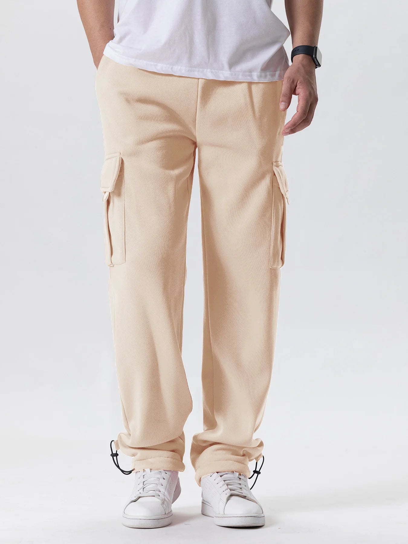 Tidesmit men's beige fleece cargo sweatpants in a loose, straight fit with side cargo pockets and drawstring cuffs.