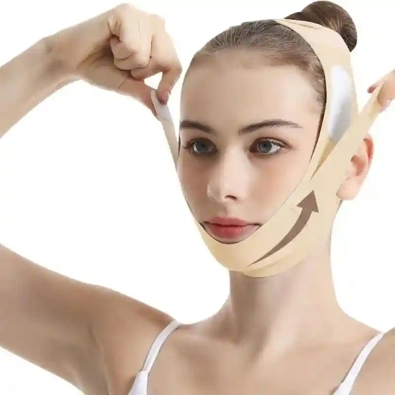 A person wearing a beige, adjustable V-line face slimming bandage strap around their chin and head.