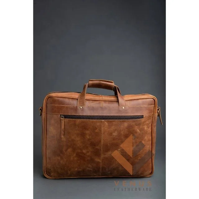 Tan genuine leather business briefcase with top handles, zipper pockets, and professional designer messenger style.
