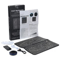 EMS foot massager set with black patterned floor mat, round control unit, remote, USB cable, and adhesive pads.
