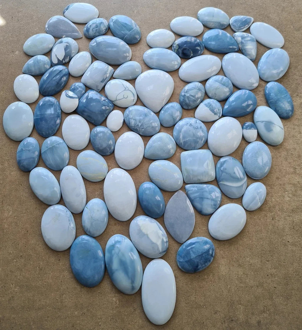 Natural blue opal cabochon gemstones, large and small ovals, assorted sizes