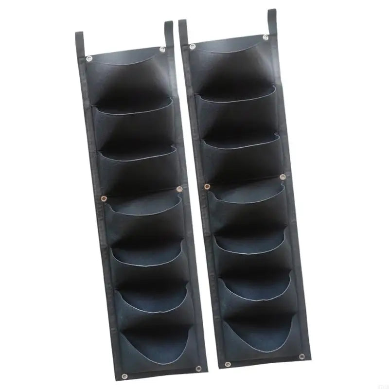 Two black vertical wall grow bags with 7 pockets each